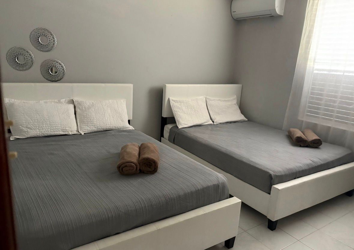 Preparación de camas y toallas para Airbnb